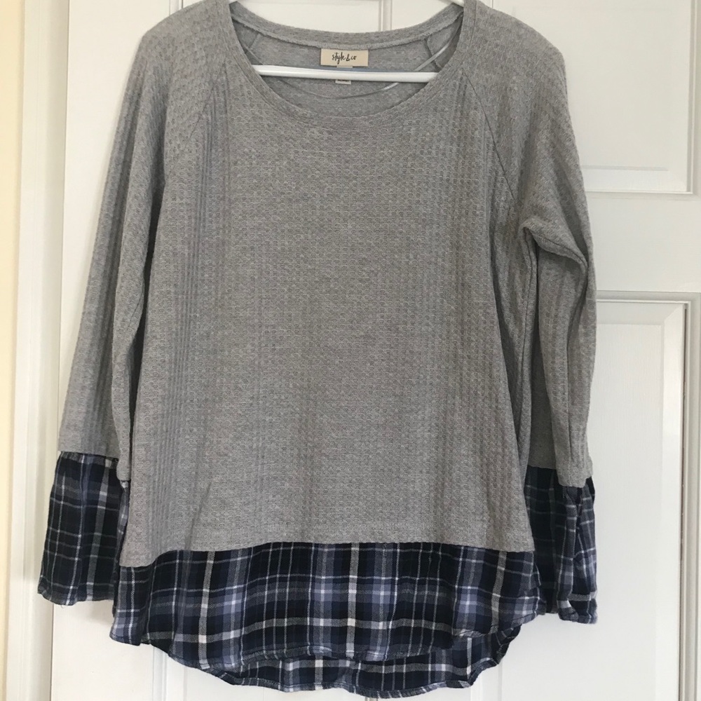 Super cute top with layered hem and cuffs